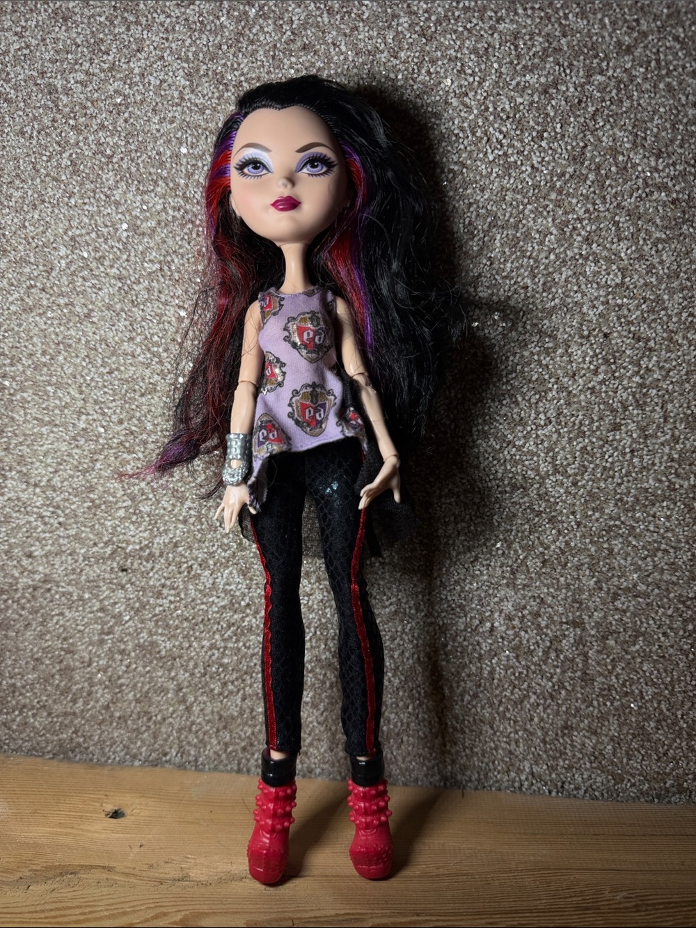 Fashion Doll in Black & Red Outfit with Purple Highlights